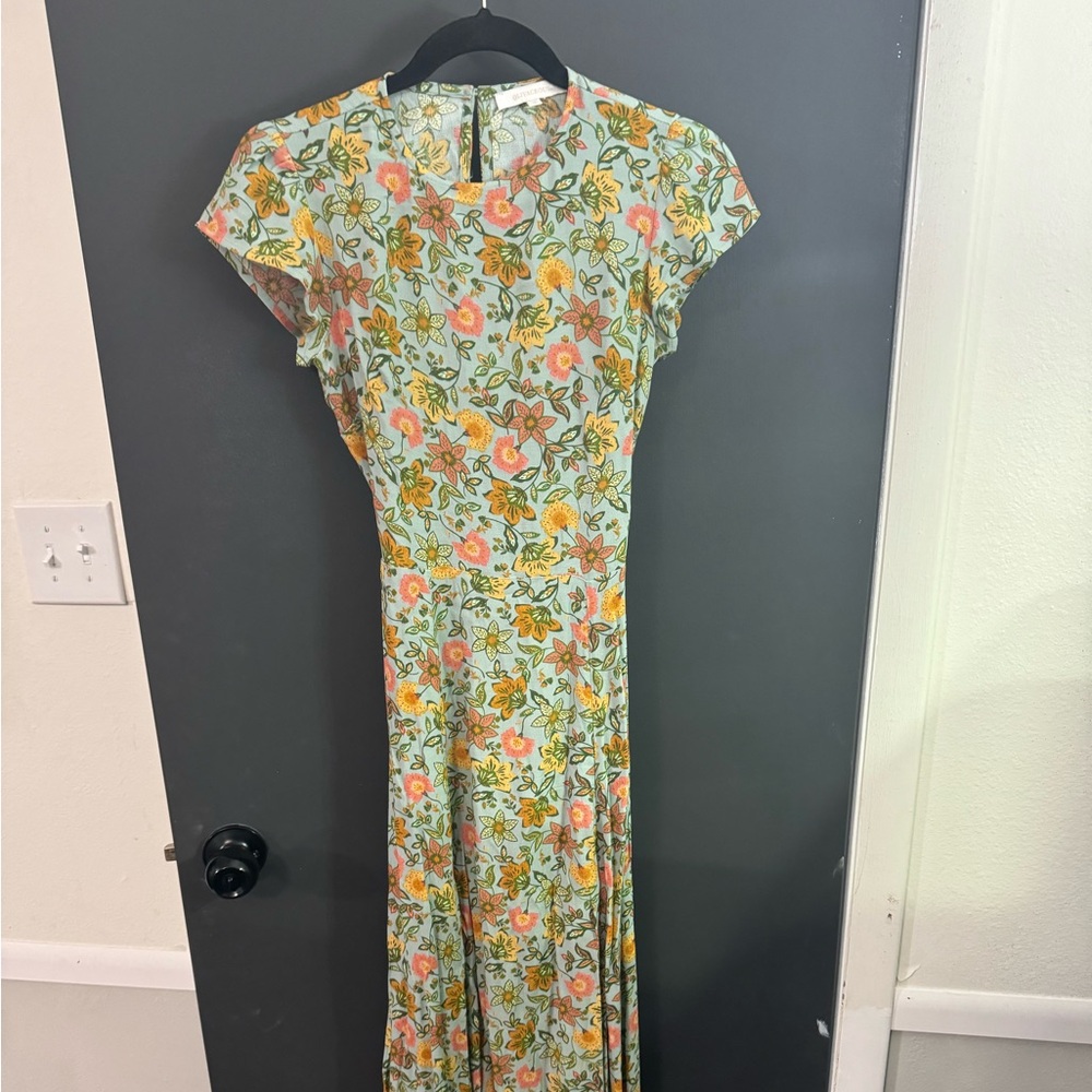 boutique dress with back cut out and high slip size small